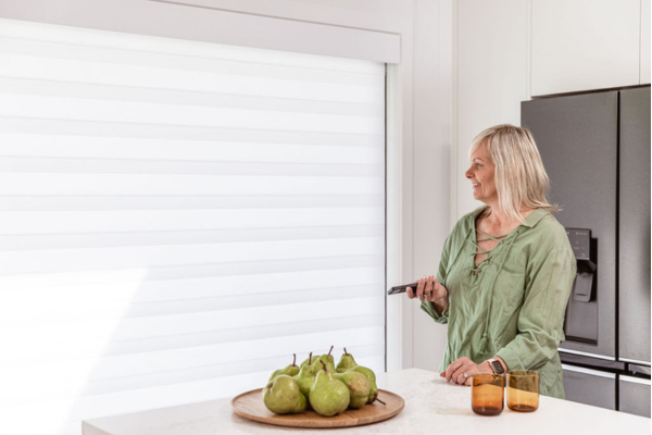NZ lady enjoying her new motorised blinds